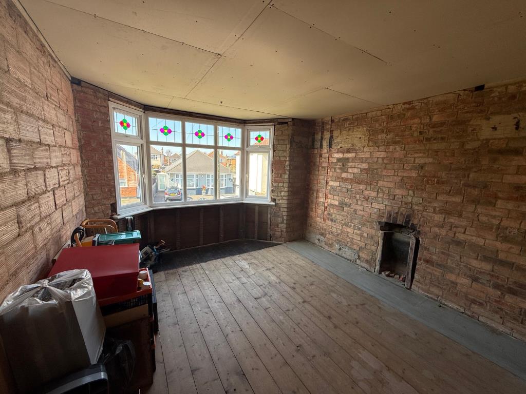 Lot: 143 - FREEHOLD DETACHED HOUSE FOR IMPROVEMENT WITH STRUCTURAL MOVEMENT - A View of one of the bedrooms, looking to the front